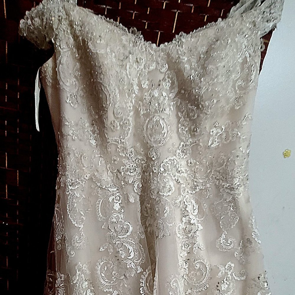 Never used wedding gown size 22